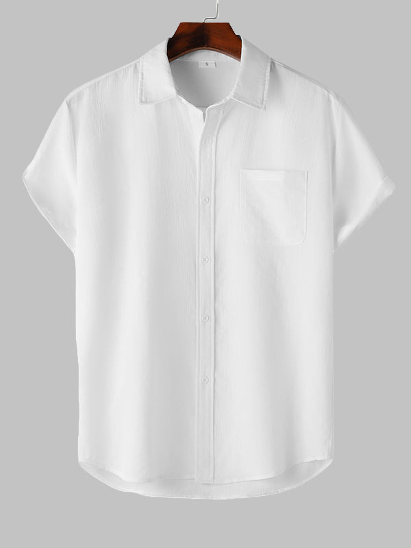 Camisa de manga corta casual de algodón sólida de color liso para hombre