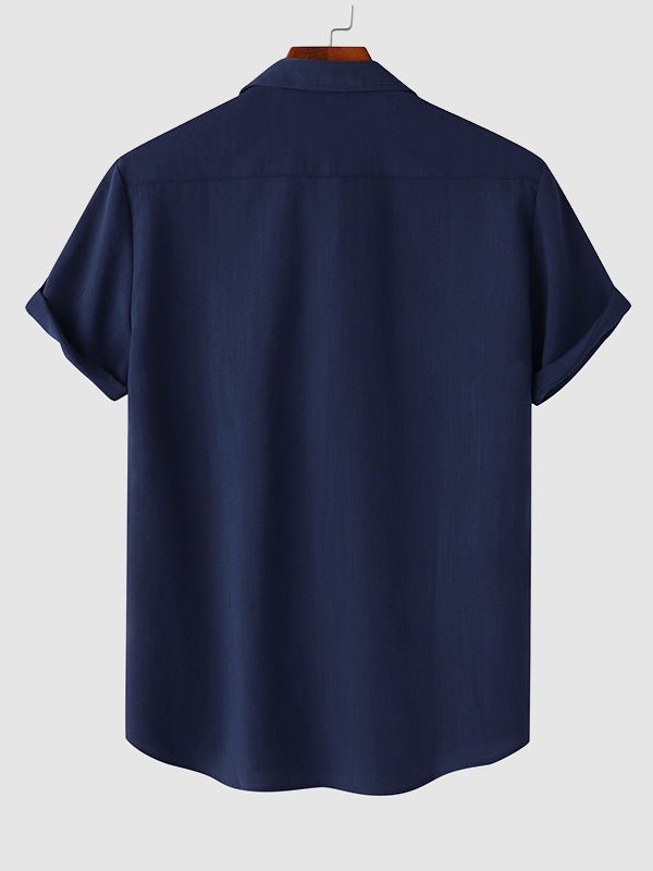 Camisa de manga corta casual de algodón sólida de color liso para hombre