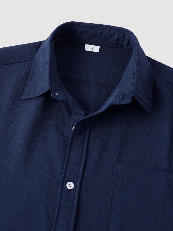 Camisa de manga corta casual de algodón sólida de color liso para hombre