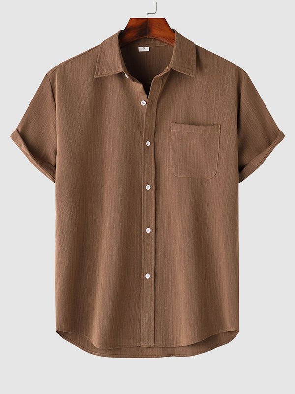 Camisa de manga corta casual de algodón sólida de color liso para hombre