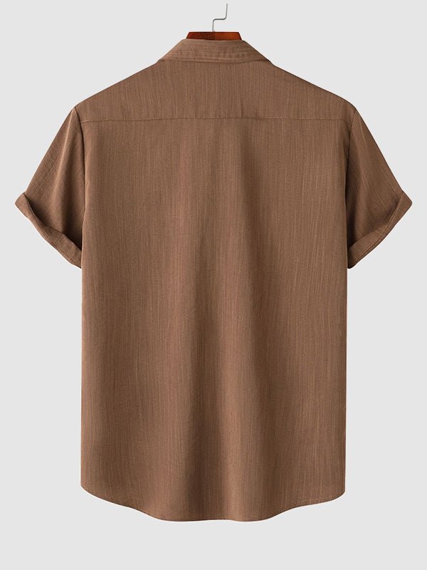 Camisa de manga corta casual de algodón sólida de color liso para hombre
