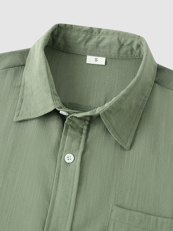 Camisa de manga corta casual de algodón sólida de color liso para hombre