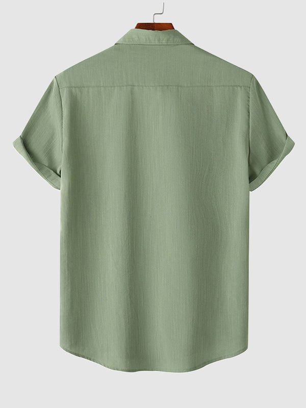 Camisa de manga corta casual de algodón sólida de color liso para hombre