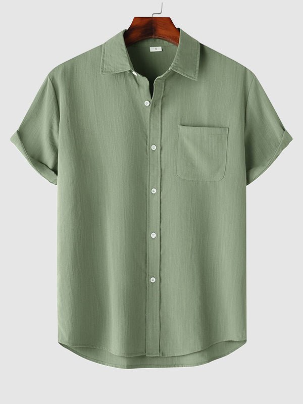 Camisa de manga corta casual de algodón sólida de color liso para hombre
